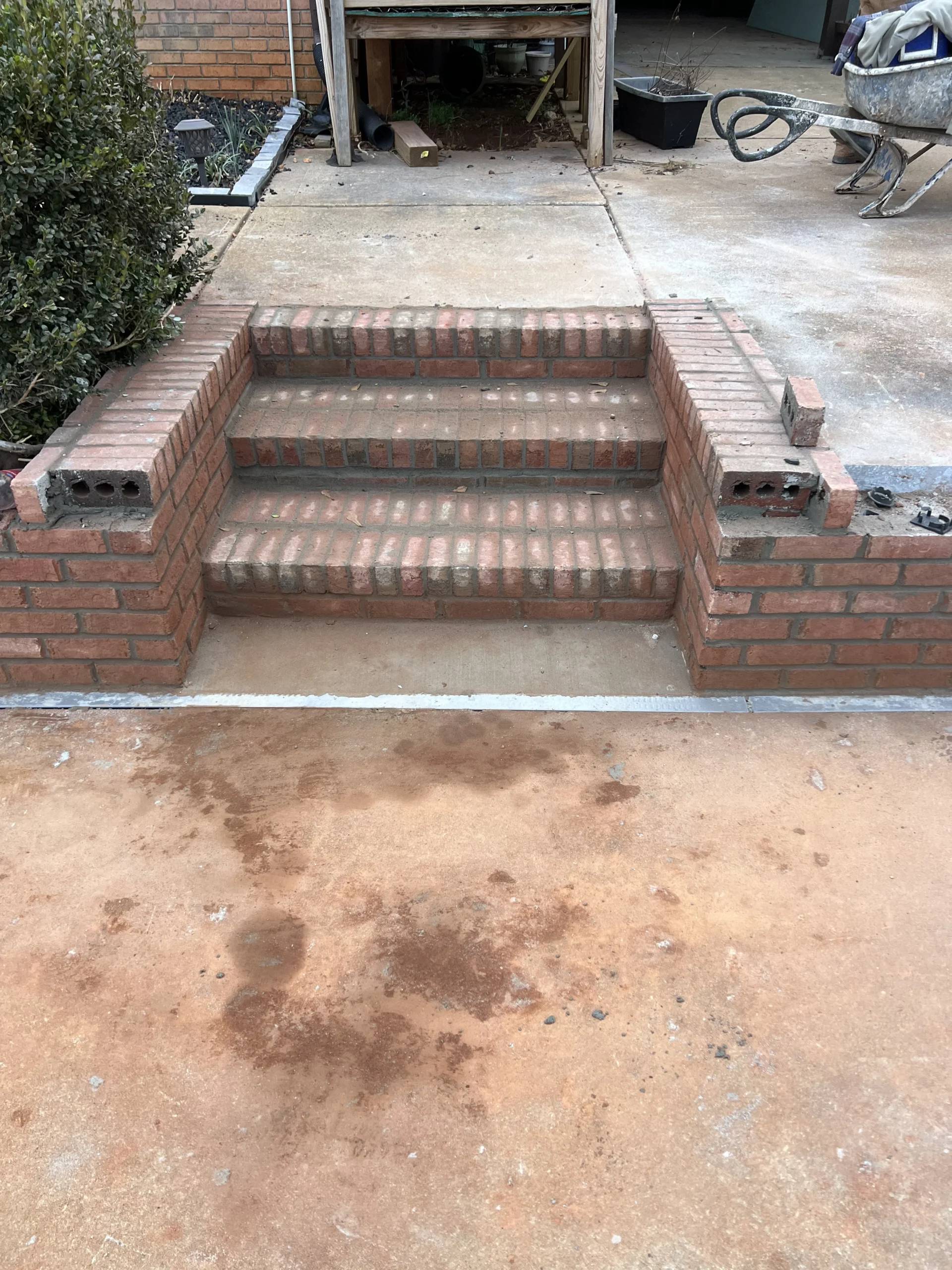 Custom brick entryway steps and stoop installation for residential home in Metro Atlanta