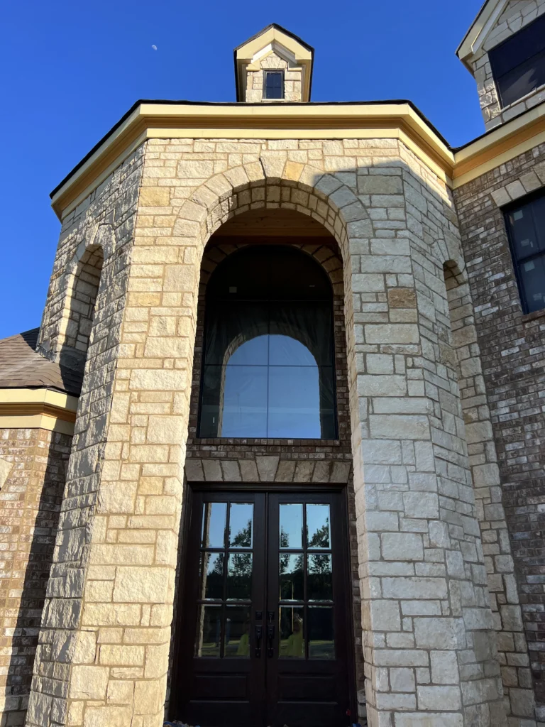 Natural stone veneer columns and exterior masonry installation