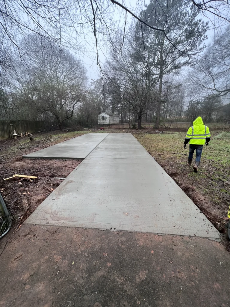 Newly poured concrete driveway installation for residential property in Metro Atlanta